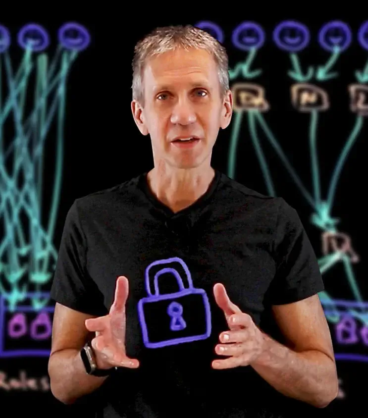 Jeff Crume at the lightboard, a neon padlock drawn on the glass over his chest